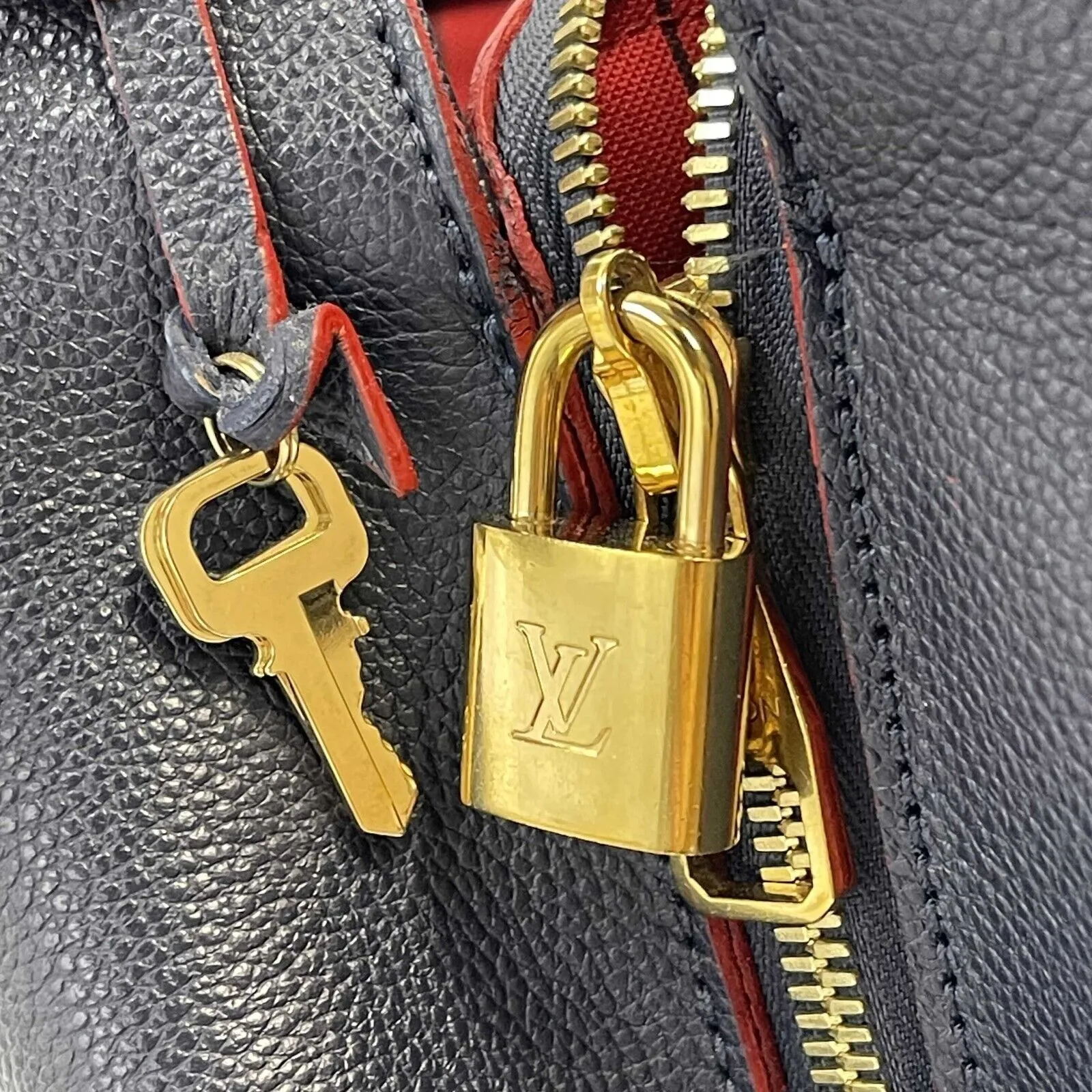 Louis Vuitton Marine Rouge Empreinte Montaigne GM