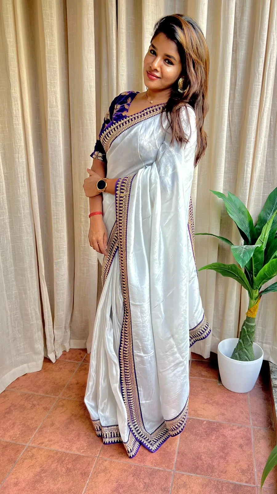 Silver silk saree with purple hand work blouse