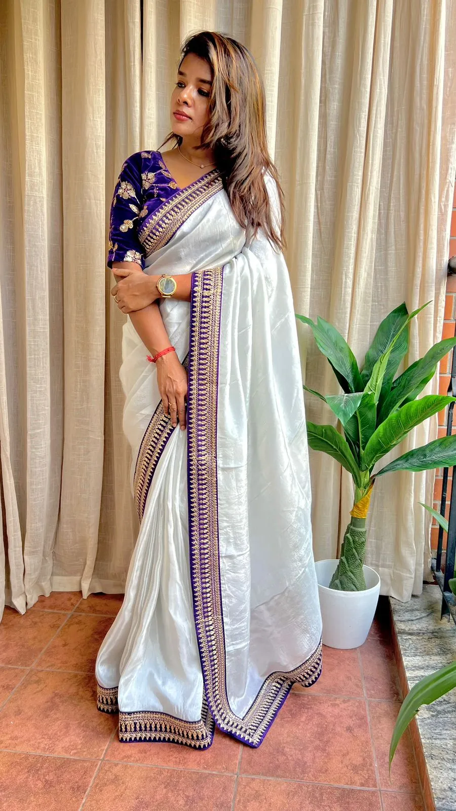 Silver silk saree with purple hand work blouse