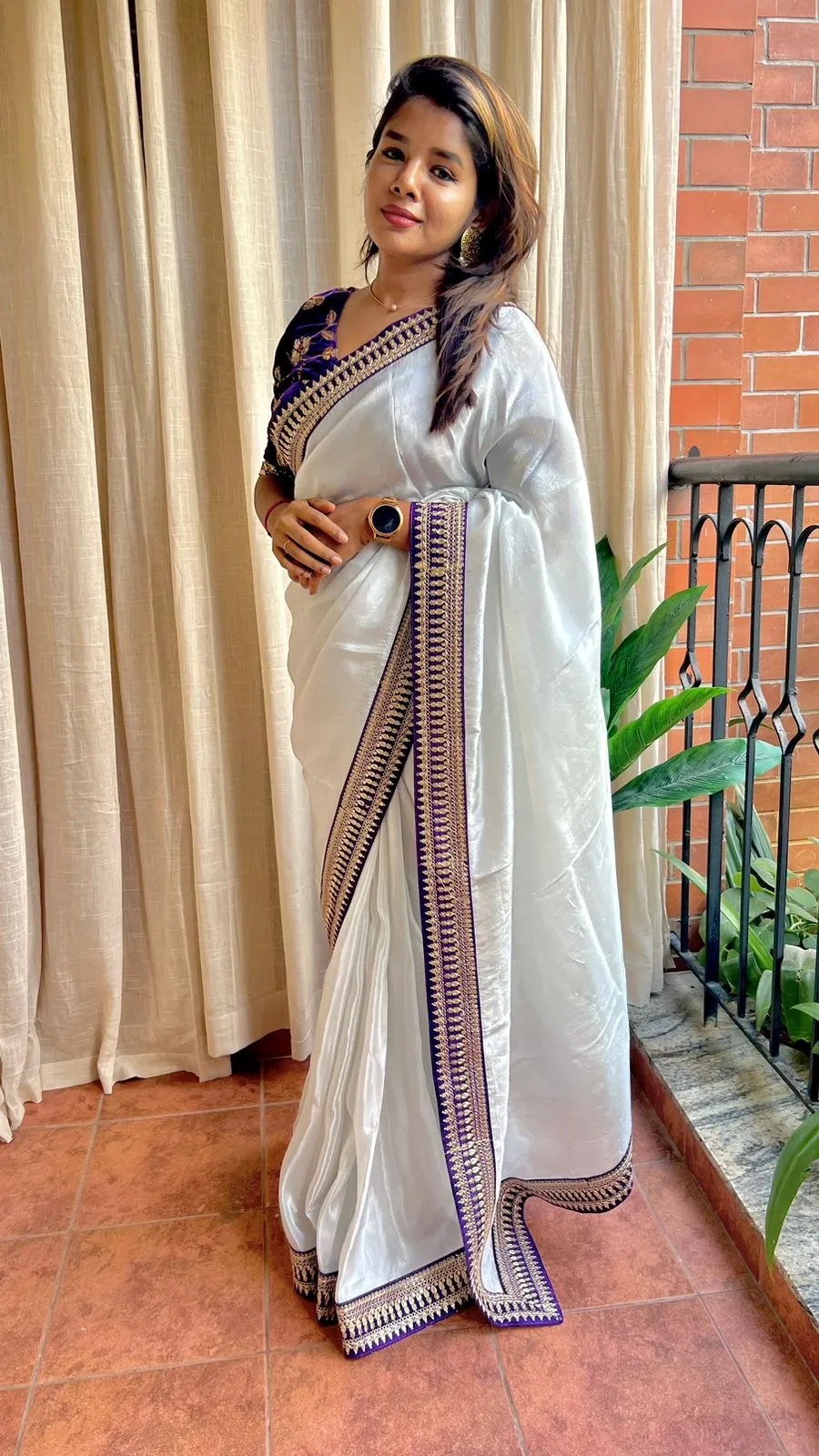 Silver silk saree with purple hand work blouse