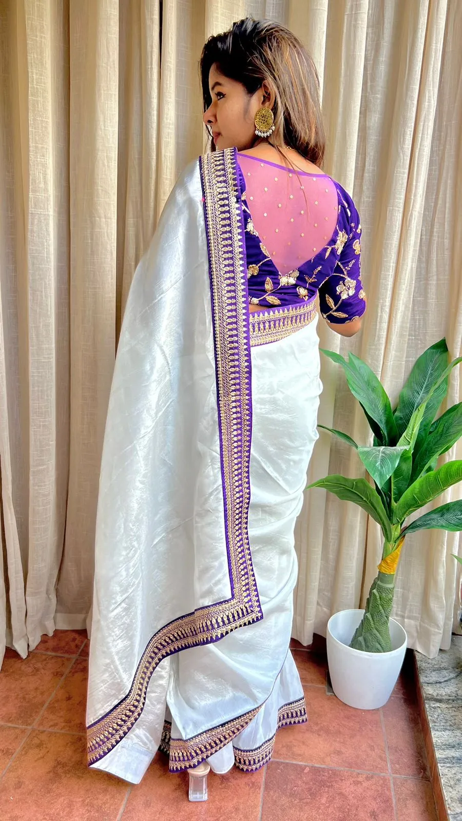 Silver silk saree with purple hand work blouse