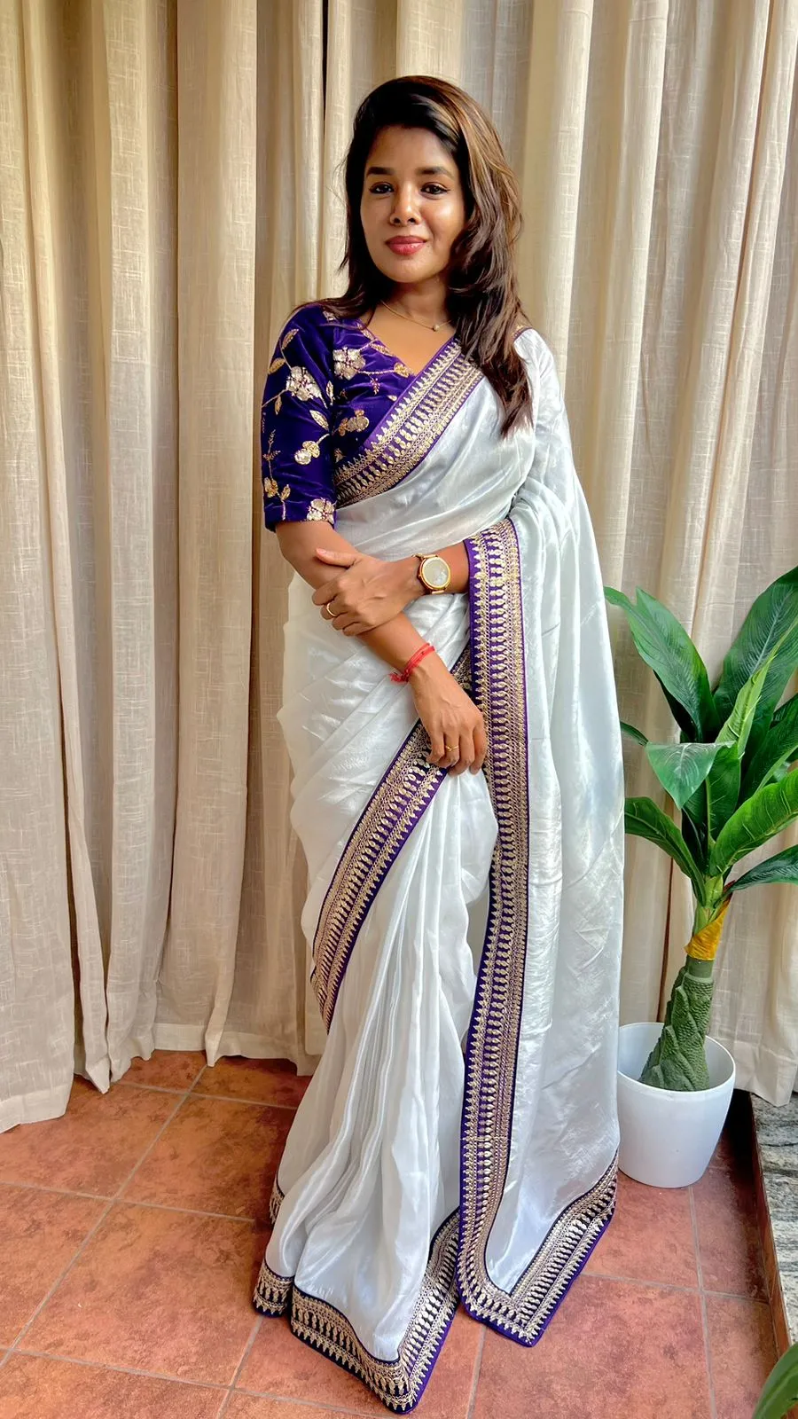 Silver silk saree with purple hand work blouse