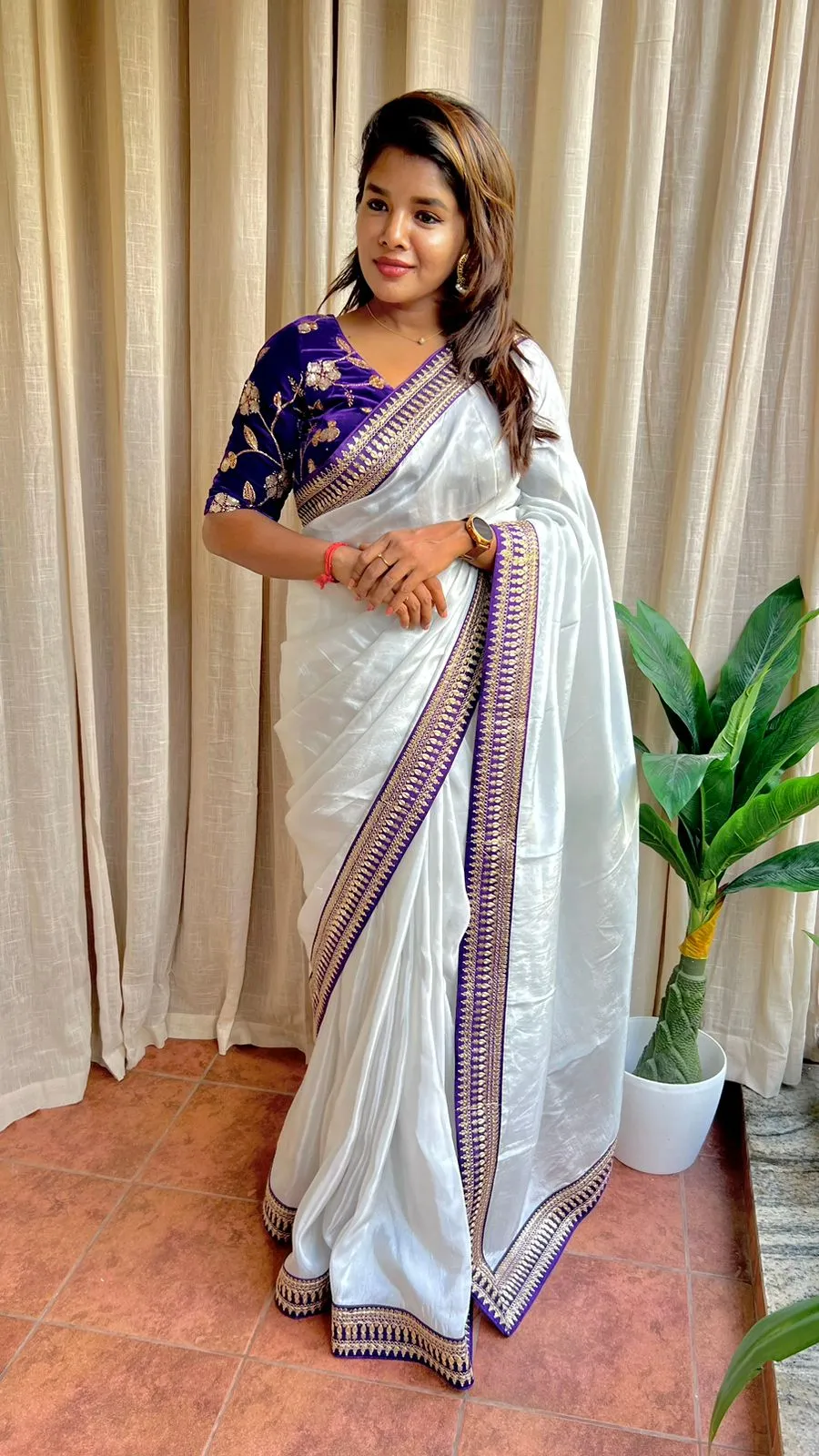 Silver silk saree with purple hand work blouse
